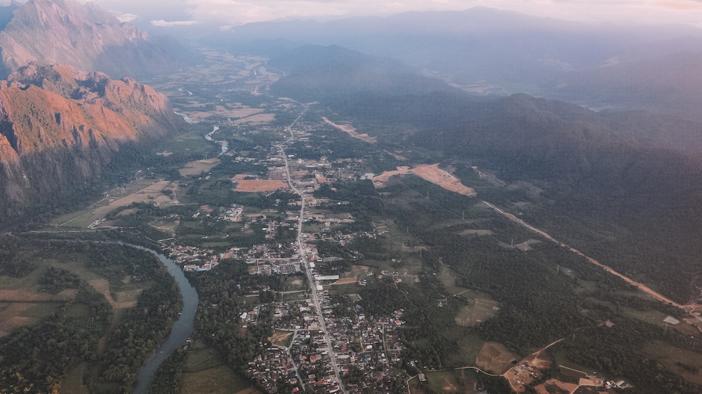 The sun rises over the karst mountains of Vang Vieng